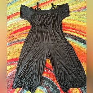 One piece plus size jumpsuit, tags removed but fits 3x to 5x